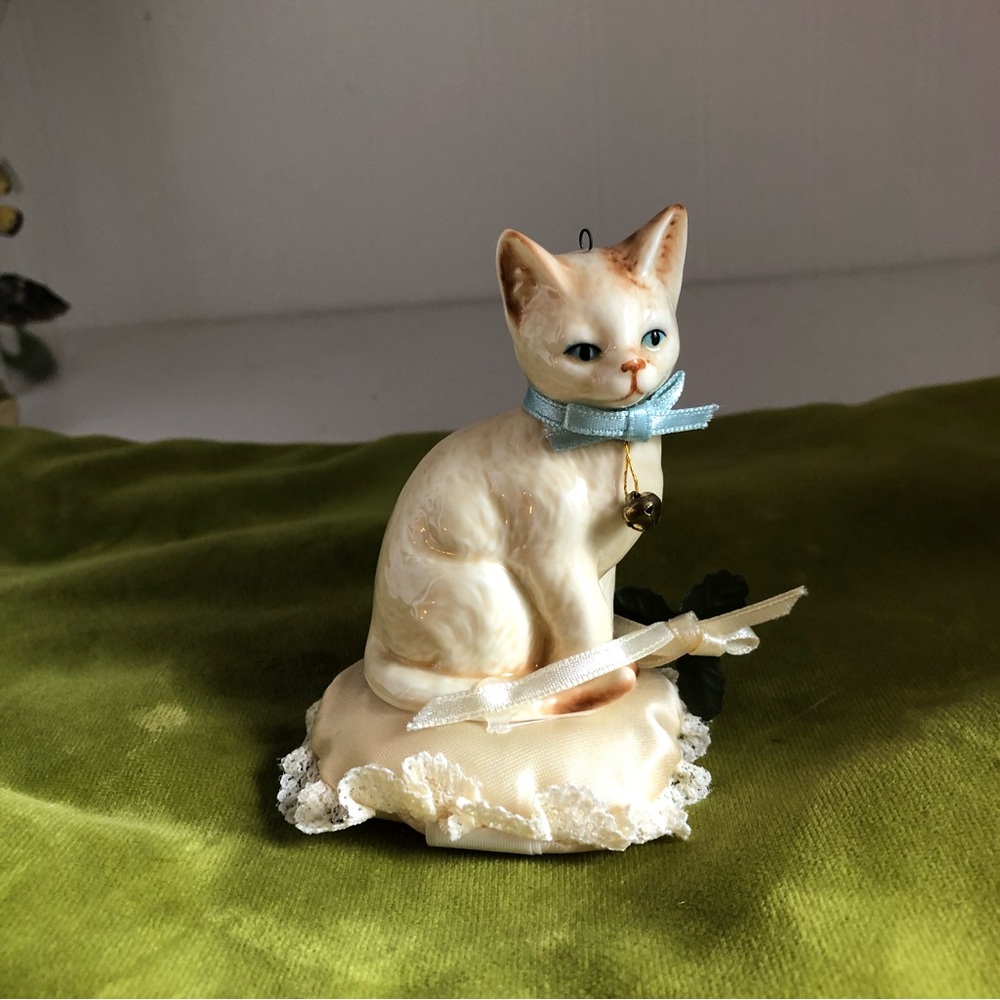 Vintage Cream Porcelain Cat Figurine with Blue Ribbon